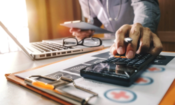 doctor calculating bill